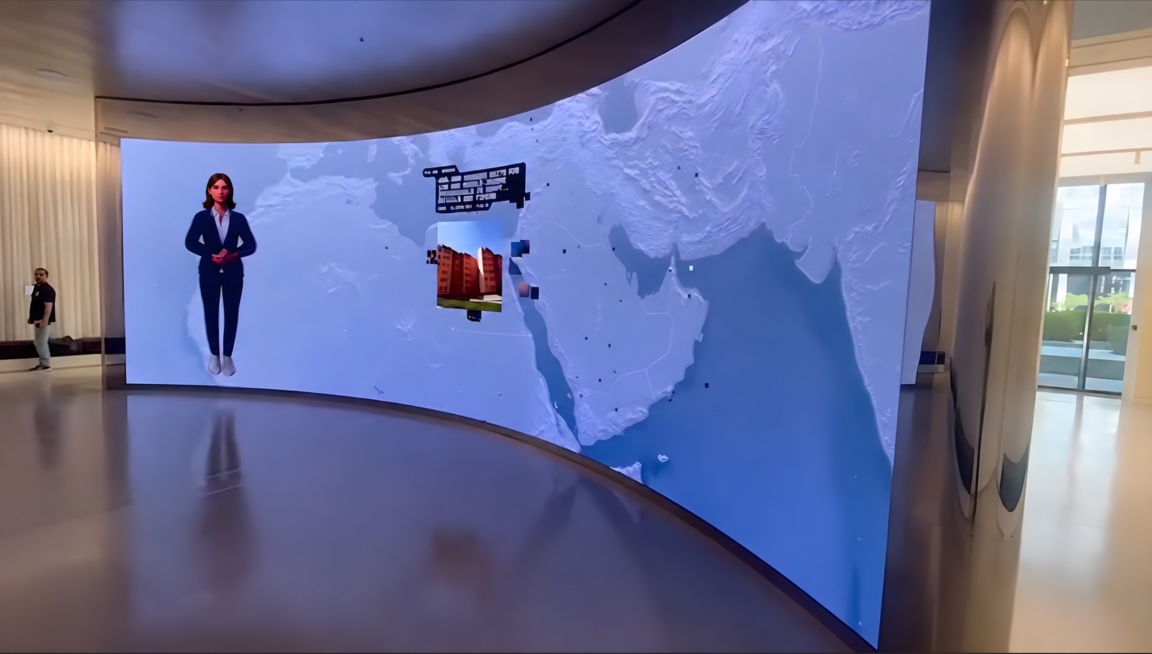 Noor, the Know-Me news presenter, on the welcome screen at IMI headquarters, Abu Dhabi.